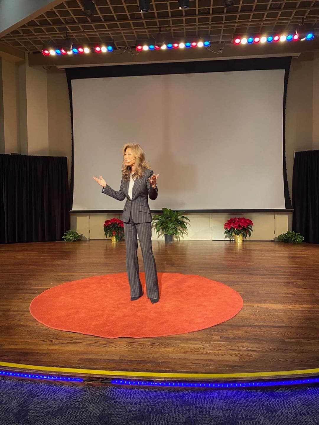 Manna Ko speaking on the TEDx stage